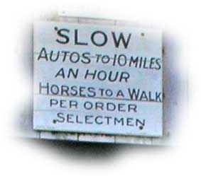 Slow down sign at a Montgomery bridge