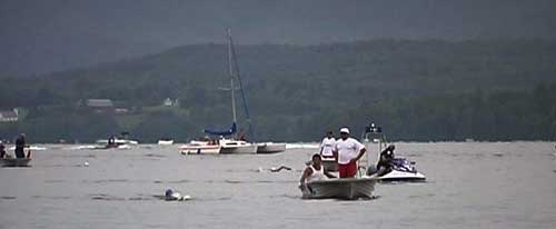 Peter Stoychev swims into Magog after more than 8 hours in the water